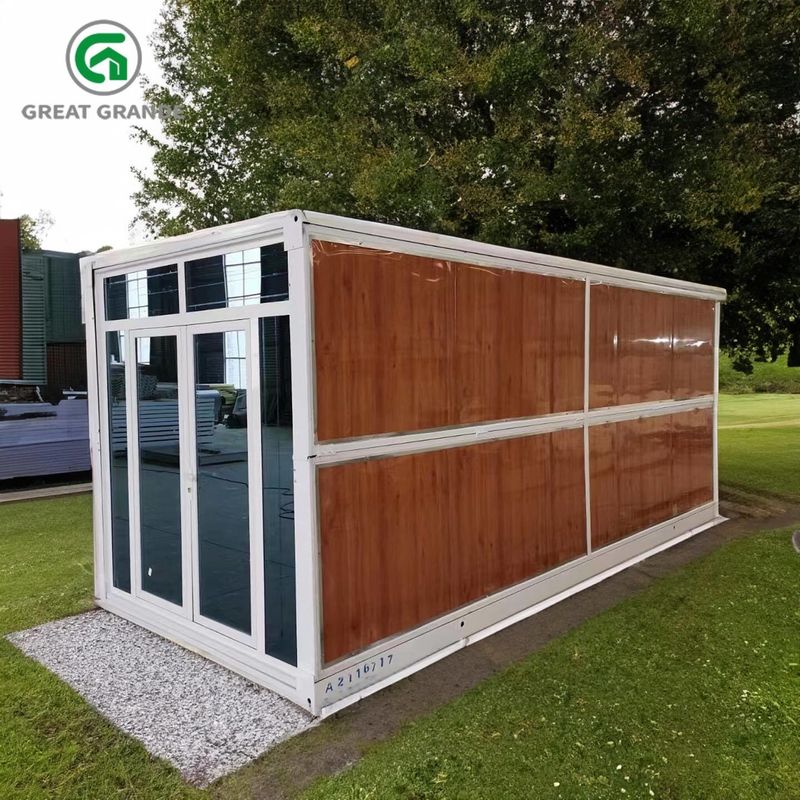 Προσαρμοσμένο Prefab Διπλώσιμο Κουτί Σπίτι Χάλυβα Γυάλινη πόρτα Καφέ τοίχος Διαθέσιμο για ενοικίαση